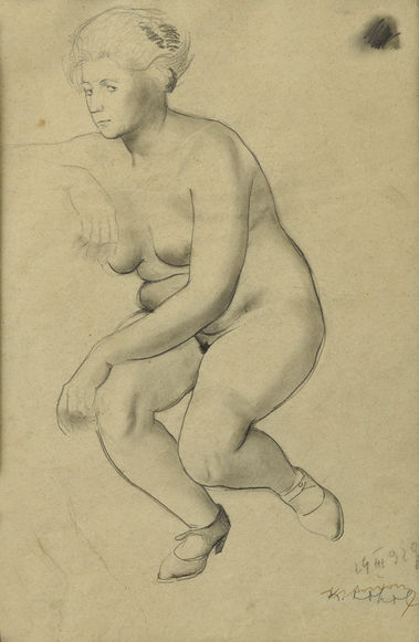 Sediaci ženský akt