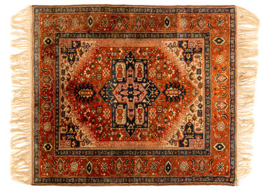 Koberec orientálny s oranžovou bordúrou