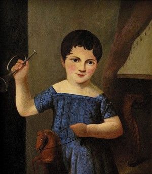 Chlapček s trúbkou a koníkon