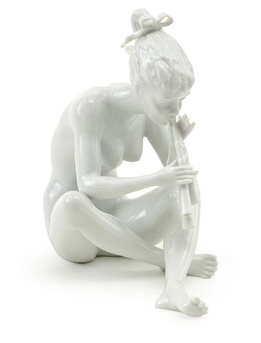 Dievča hrajúce na píšťale