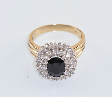 PRSTEŇ S TMAVOMODRÝM ZAFÍROM A DIAMANTMI